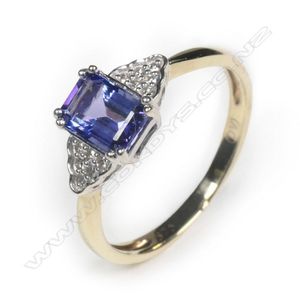 A 9ct yellow gold tanzanite and diamond ring, the white gold…