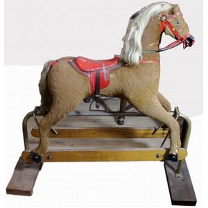 An early 20th century painted rocking horse, the mottled brown…