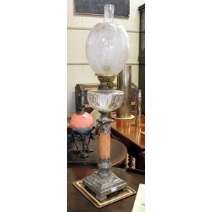 Antique oil lamp. Single burner with clear glass font and…