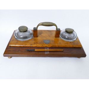 A New Zealand timber desk stand, the upper section of burr…