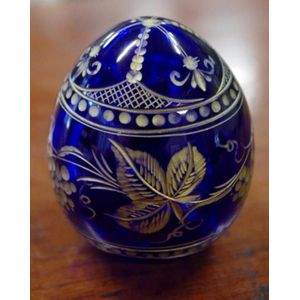 Faberge deep blue glass egg, with gilt floral and leaf…