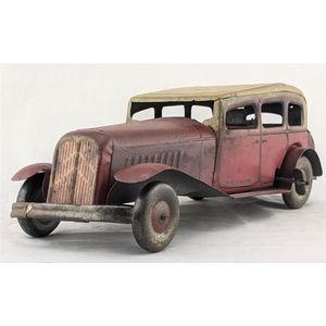 Tin plate wind up Citroen saloon car. Made in England, possibly…