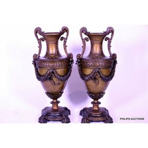 A pair of spelter urns by Louis & Francois Moreau, late 19th…