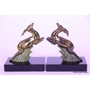 A pair of leaping deer spelter bookends, circa 1930, in…
