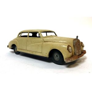 A tin plate litho friction powered cream Mercedes with plaid…