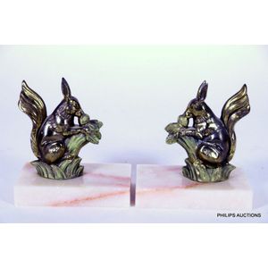 A pair of Art Deco spelter squirrel bookends, circa 1930, cold…