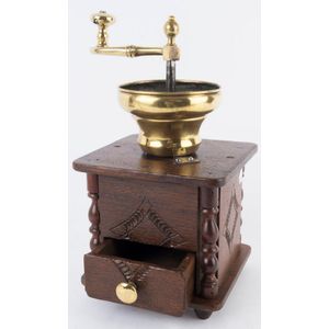 An antique oak and brass coffee grinder by J. A. Maus, 19th…