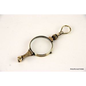 An antique gilt metal lorgnette, early 20th century, apparently…