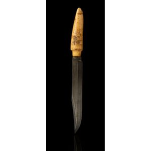A whaler's knife with scrimshaw handle, 19th century, 34 cm long