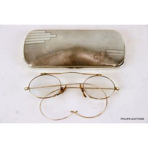A pair of 9ct gold spectacles and an .800 German silver…