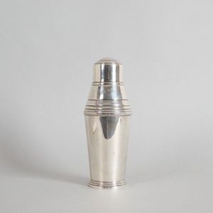 A sterling silver cocktail shaker, hallmarked. John Bagshaw &…