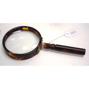Vintage tortoiseshell framed magnifying glass height 17 cm.