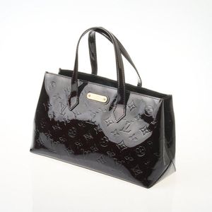 Sold at Auction: Prada - Odette Saffiano Leather Silver Belt Bag
