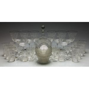 A large suite of wreath and ribbon etched crystal wares…
