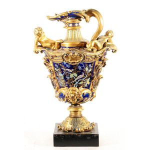 A large gilt and cobalt Ironstone vase featuring pheasants and…