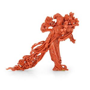 A coral figure of Lan Caihe, the slender figure carrying a&hellip;
