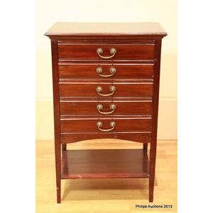 A mahogany music cabinet, early 20th century, comprising five…