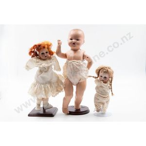 All composition baby doll and two bisque dolls blue sleeping…