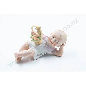 Heubach bisque piano baby reclining character baby holding…