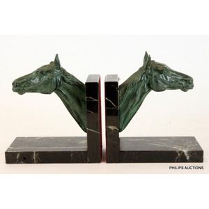 A pair of Art Deco spelter horse bookends, circa 1930 modelled…