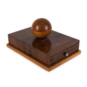 A Continental Art Deco musical cigar box with world globe…