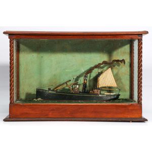 An antique cased model boat display of Craignoon 6m Ky279,…