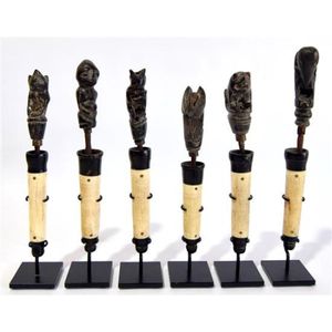 A set of six finely carved betel nut crushers with bone mortars,…