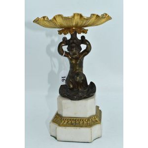 An impressive Victorian gilt bronze centrepiece depicting a…