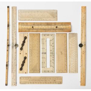 A collection of ivory etched rulers and calibration instruments,…