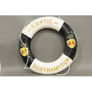 A vintage English ship's painted canvas and cork life preserver…