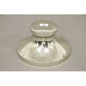 A silver plate Commonwealth Dominion Line circular desk inkwell…