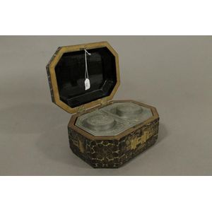 A mid Victorian octagonal black lacquered tea caddy with…