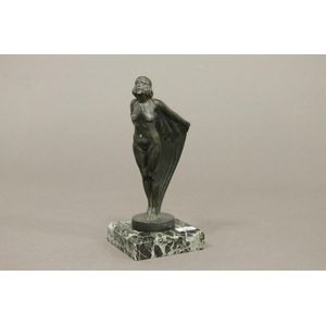 An Art Deco bronzed nude figure on a varigated marble base,…