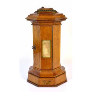 A rare Victorian oak letter post box, c.1871 -1880, with makers…