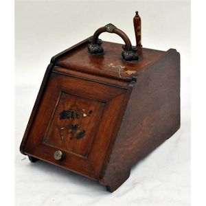 An unusual inlaid Victorian oak coal scuttle in the Japanese…