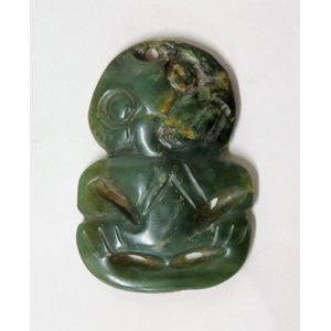 A 19th/20th century Maori greenstone hei tiki, mid/dark green…