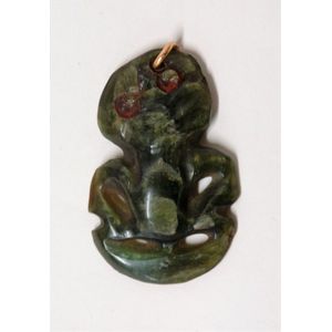 A 19th century Maori pounamu hei tiki, translucent bowenite…