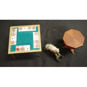 Three pieces of miniature dolls house furniture comprising a…