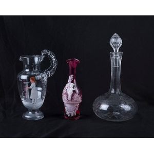 Mary Gregory clear glass jug and a ruby glass cruet bottle, and…