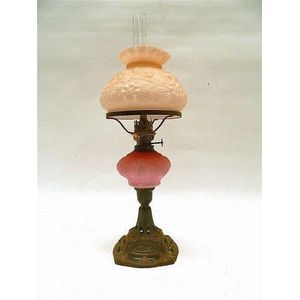 A small French Art Nouveau desk oil lamp, with pink blush…