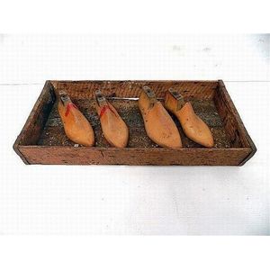 A Redfern shoe factory tray, containing original shoe lasts