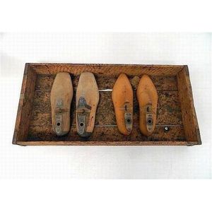A Redfern shoe factory tray, containing original shoe lasts