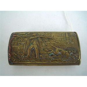 A late-Victorian nickel match case, the side relief decorated…