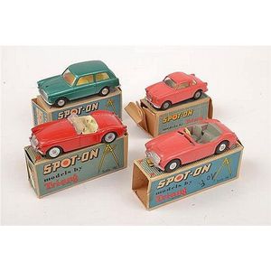 Four Spot On models, including 154 Austin A.40, Mettalic green;…