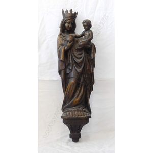 A 19th century European fruit wood carved Madonna and Child,…