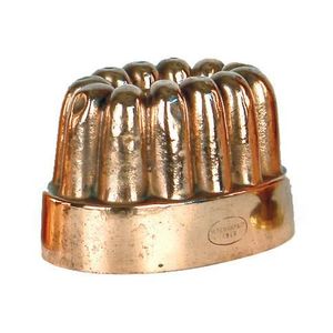 A small old copper castellated jelly mould, of oval shape, by H.…