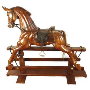A modern hand crafted Victorian style rocking horse, the carved…