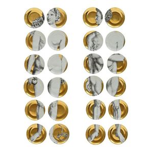 Fornasetti 'Adam & Eve' set of twenty four plates, designed in…
