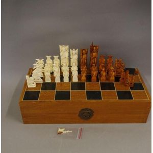 Chess pieces: 32 red and white ivory pieces without board., Complete number  of pieces of a chess game. Sixteen cut ivory pieces that have been made red  with a dyestuff: these are