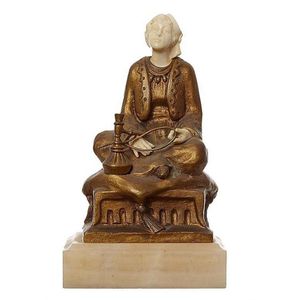 An American Art Deco ivory and gilt bronze 'Hookah' figure by H.…